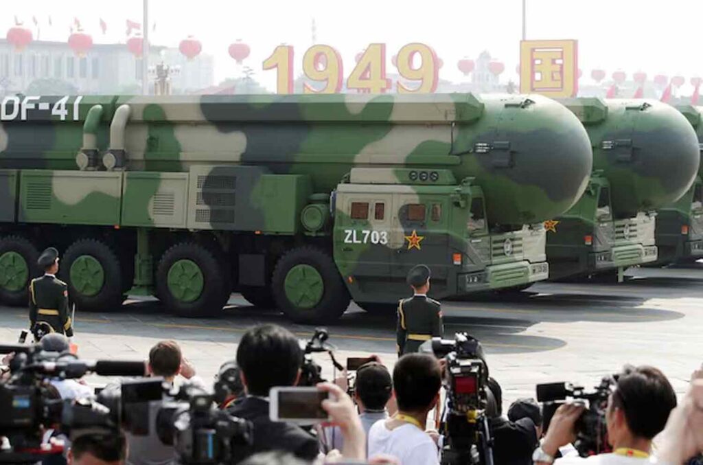 Military vehicles carrying DF-41 intercontinental ballistic missiles travel past Tiananmen Square during the military parade marking the 70th founding anniversary of People's Republic of China, on its National Day in Beijing.