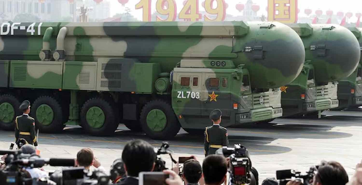 Military vehicles carrying DF-41 intercontinental ballistic missiles travel past Tiananmen Square during the military parade marking the 70th founding anniversary of People's Republic of China, on its National Day in Beijing.