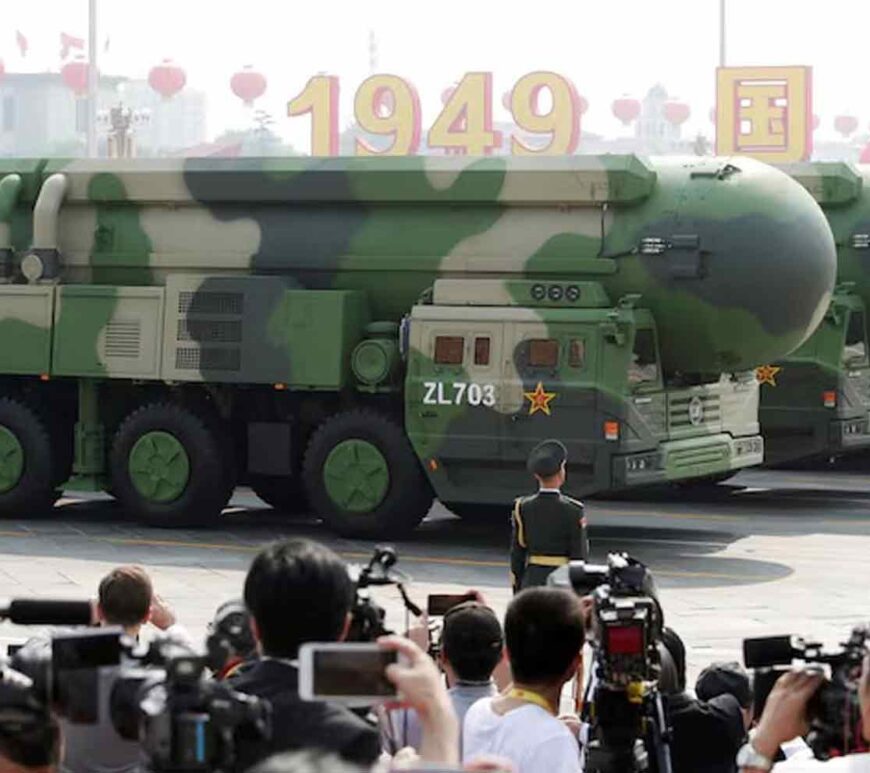 Military vehicles carrying DF-41 intercontinental ballistic missiles travel past Tiananmen Square during the military parade marking the 70th founding anniversary of People's Republic of China, on its National Day in Beijing.