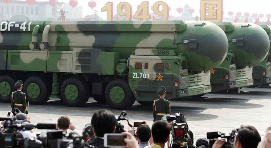 Military vehicles carrying DF-41 intercontinental ballistic missiles travel past Tiananmen Square during the military parade marking the 70th founding anniversary of People's Republic of China, on its National Day in Beijing.