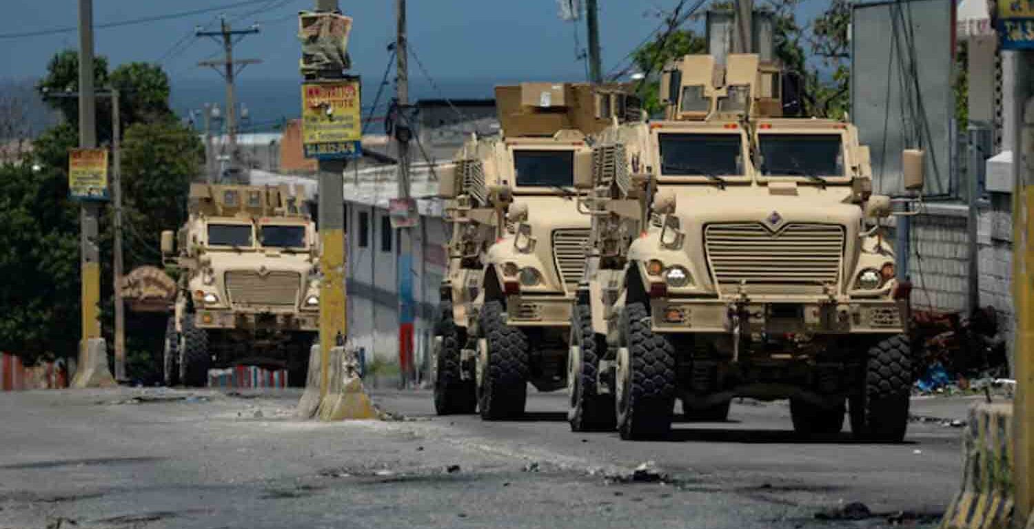 Kenyan police forces patrol a neighbourhood in Port-au-Prince, Haiti