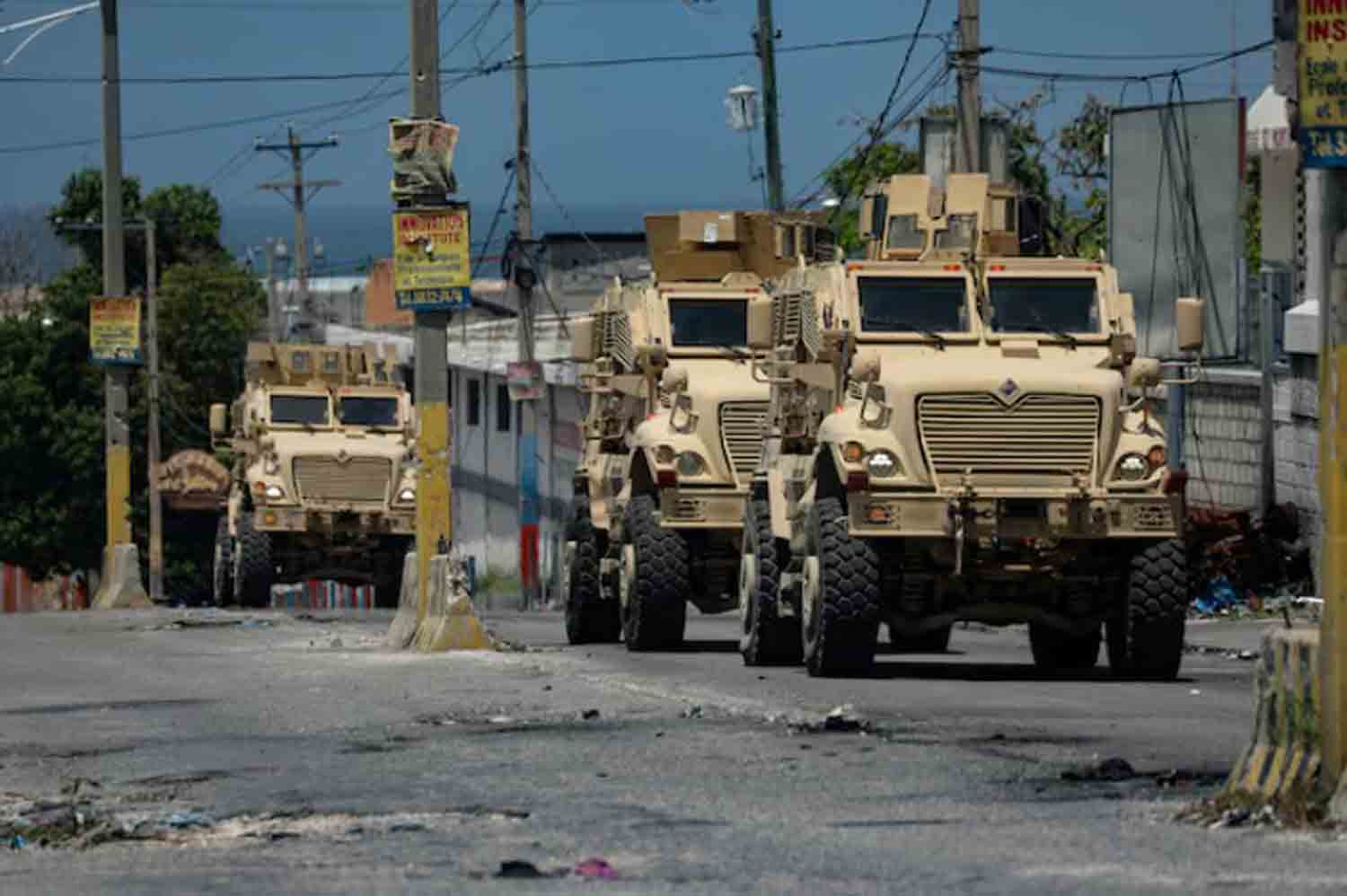 Kenyan police forces patrol a neighbourhood in Port-au-Prince, Haiti