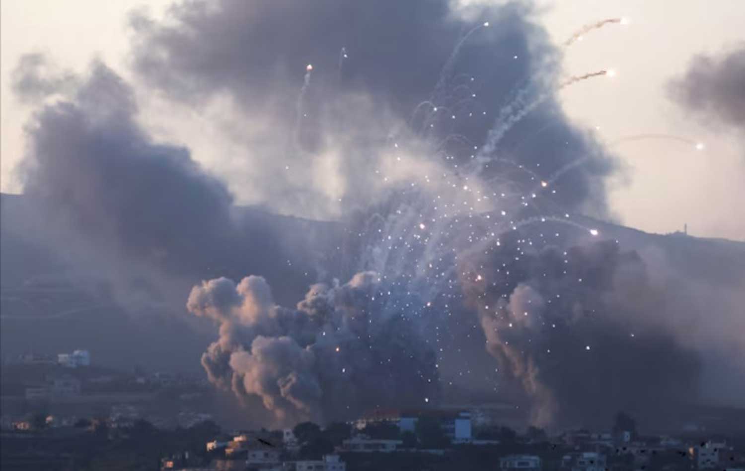 Smoke billows over southern Lebanon following Israeli strikes.