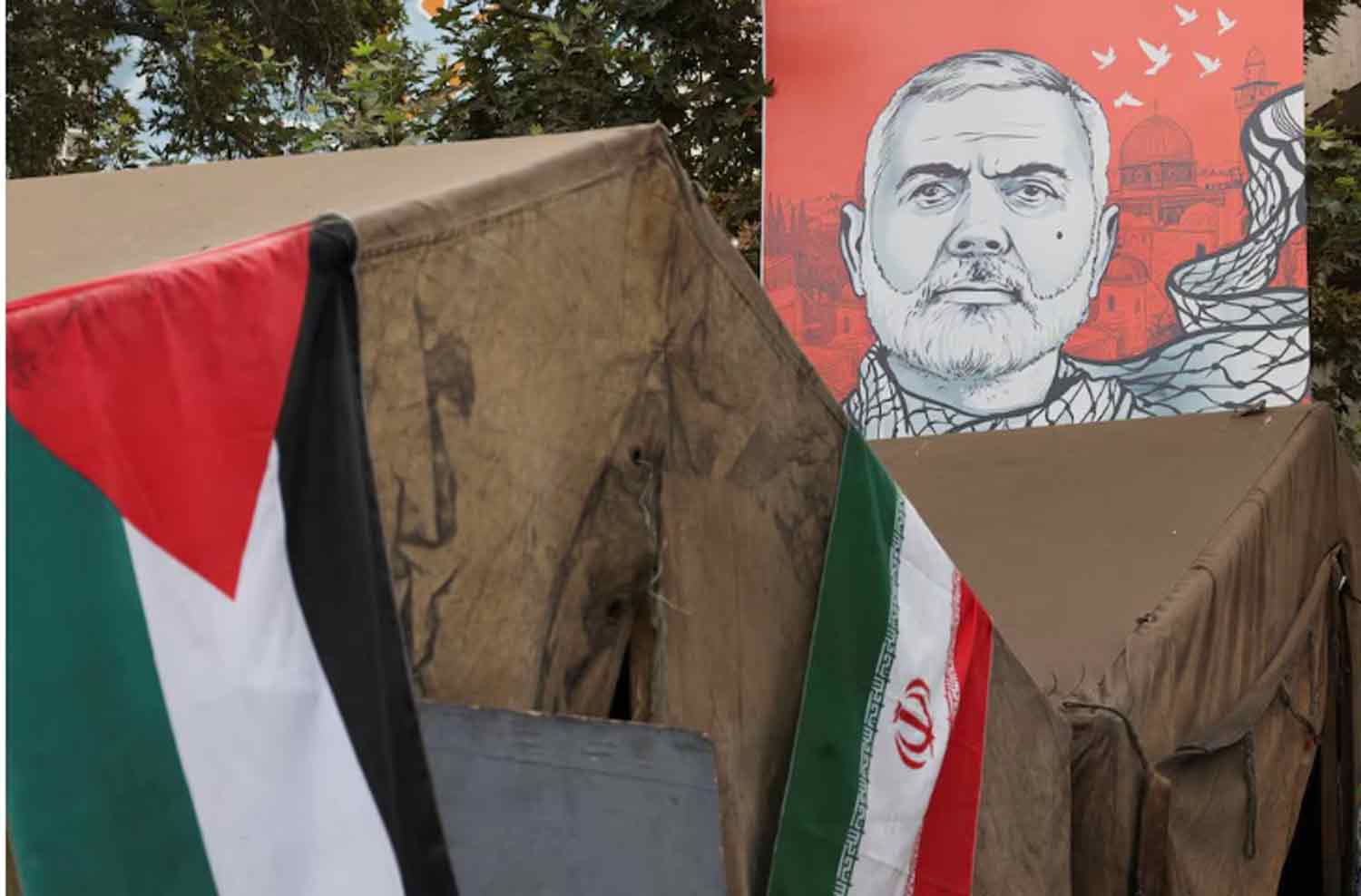 banner-with-a-picture-of-late-Hamas-leader-Ismail-Haniyeh