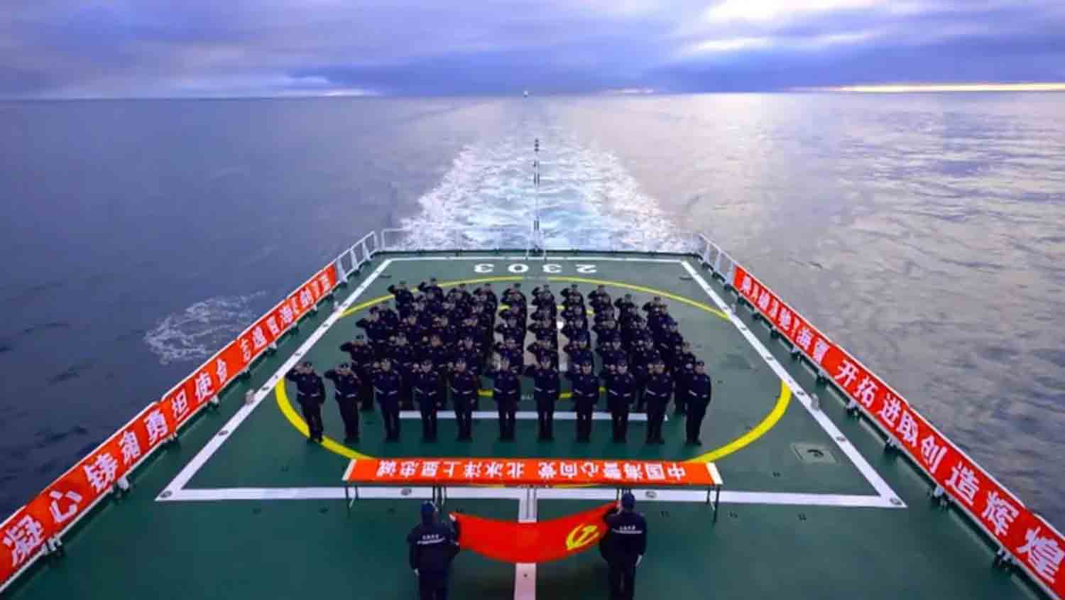 China-Coast-Guard Members of the China Coast Guard stand in formation during a joint patrol with Russia that China says entered the Arctic Ocean.