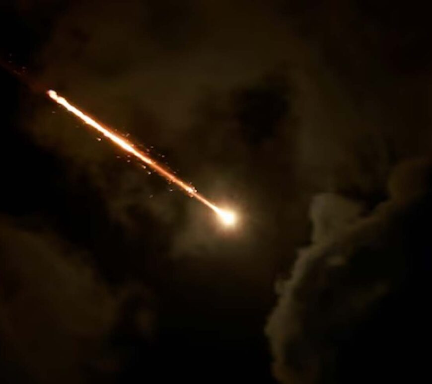 A projectile is seen in the sky after Iran fired a salvo of ballistic missiles, amid cross-border hostilities between Hezbollah and Israel, as seen from Tel Aviv, Israel.