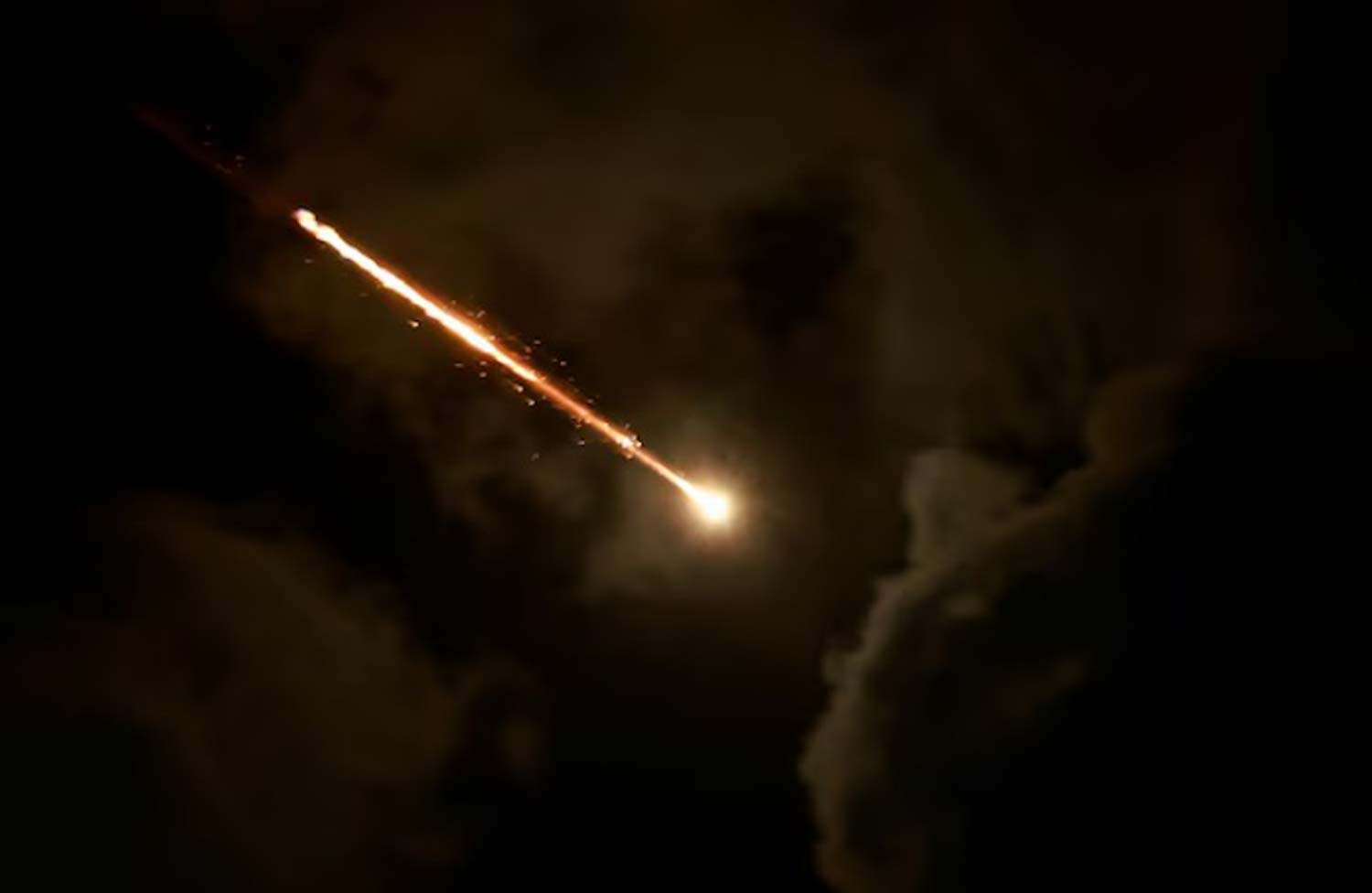 Iran-missile-assault-on-Israel A projectile is seen in the sky after Iran fired a salvo of ballistic missiles, amid cross-border hostilities between Hezbollah and Israel, as seen from Tel Aviv, Israel.
