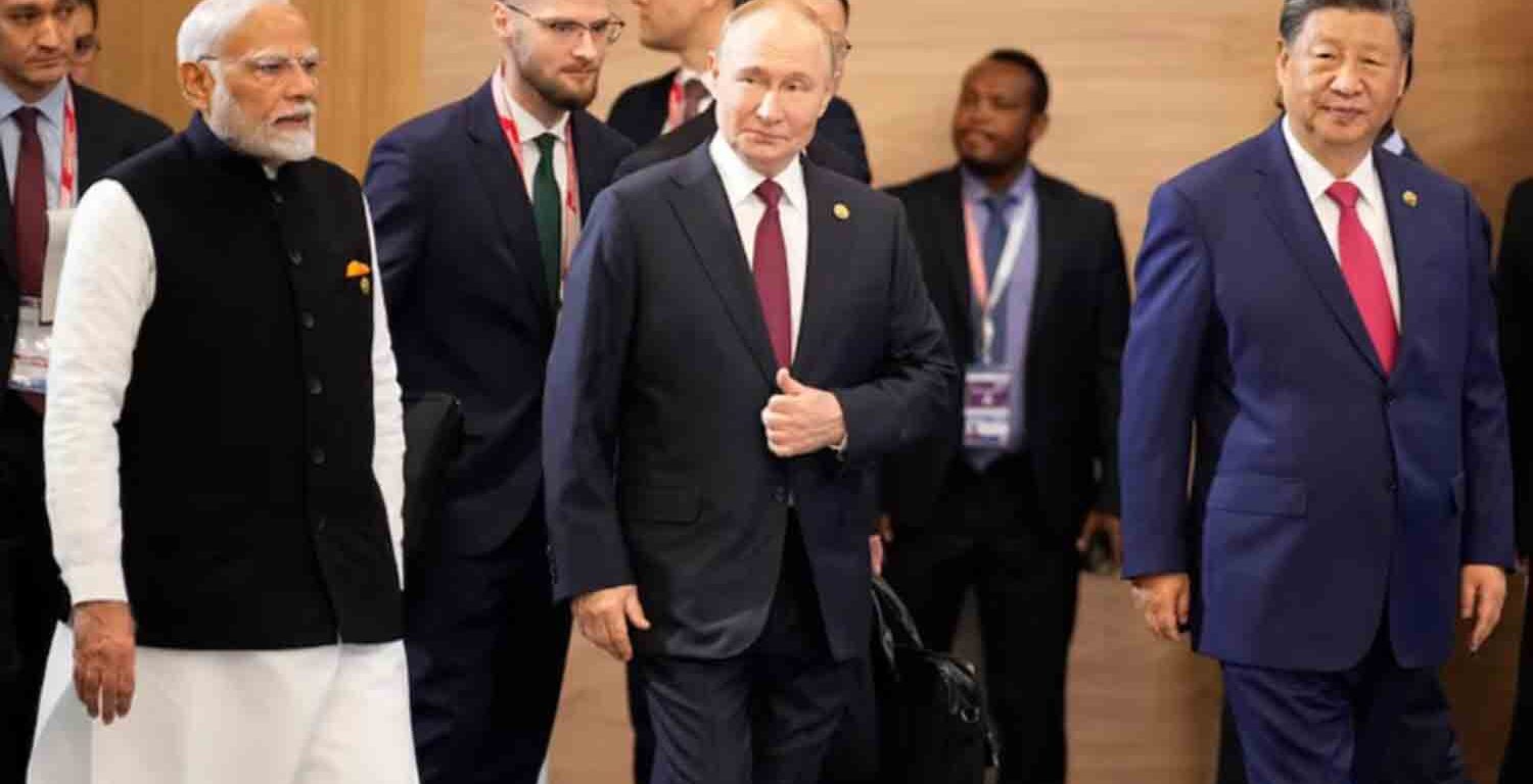 Indian Prime Minister Narendra Modi, Russian President Vladimir Putin and Chinese President Xi Jinping attend a family photo ceremony prior to the BRICS Summit plenary session in Kazan, Russia.