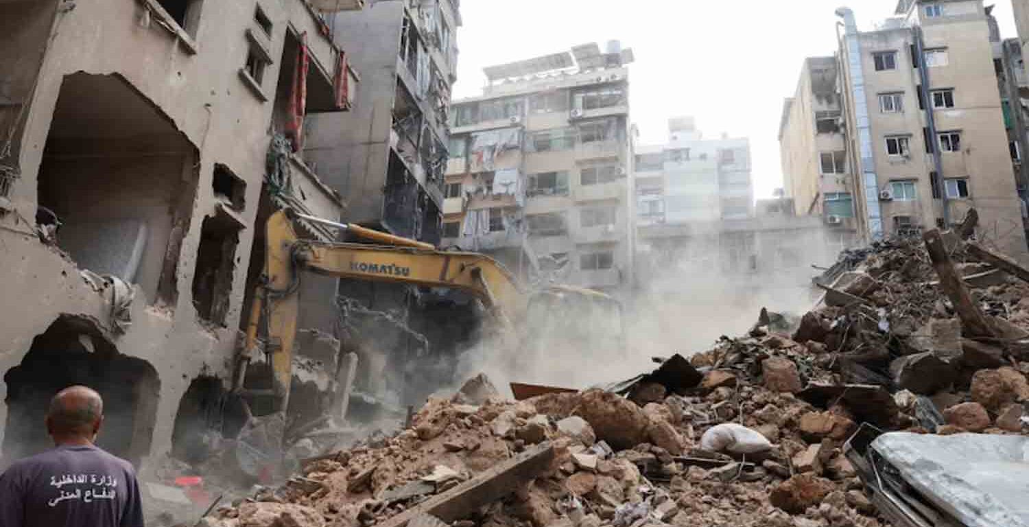 A machinery clears rubble at a site of an Israeli strike, amid ongoing hostilities between Hezbollah and Israeli forces, in Beirut, Lebanon.