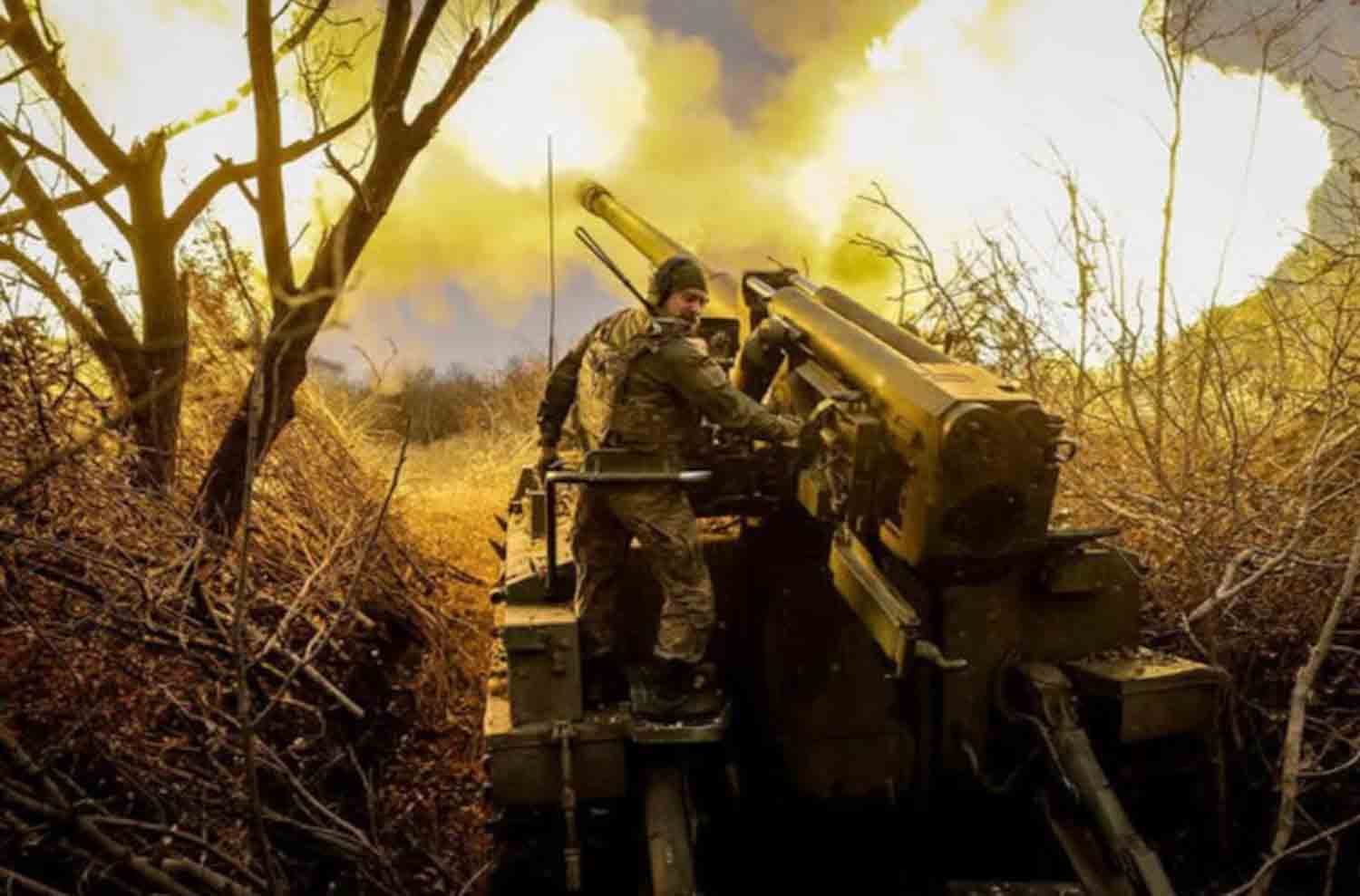 A serviceman of 24th Mechanized brigade named after King Danylo of the Ukrainian Armed Forces fires a 2s5 