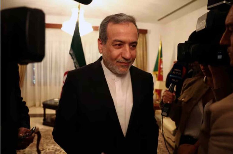 Iranian Foreign Minister Abbas Araghchi gives a briefing on the sidelines of a UN event in Lisbon, Portugal.