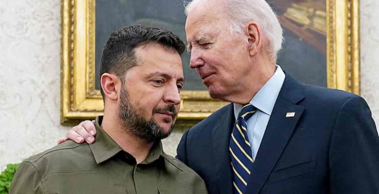 Ukrainian President Volodymyr Zelenskiy is embraced by U.S. President Joe Biden in the Oval Office of the White House in Washington.