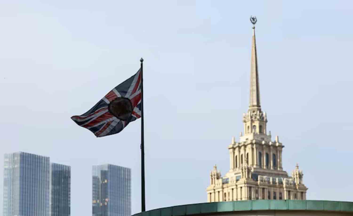 A flag flies above the British embassy in Moscow, Russia.