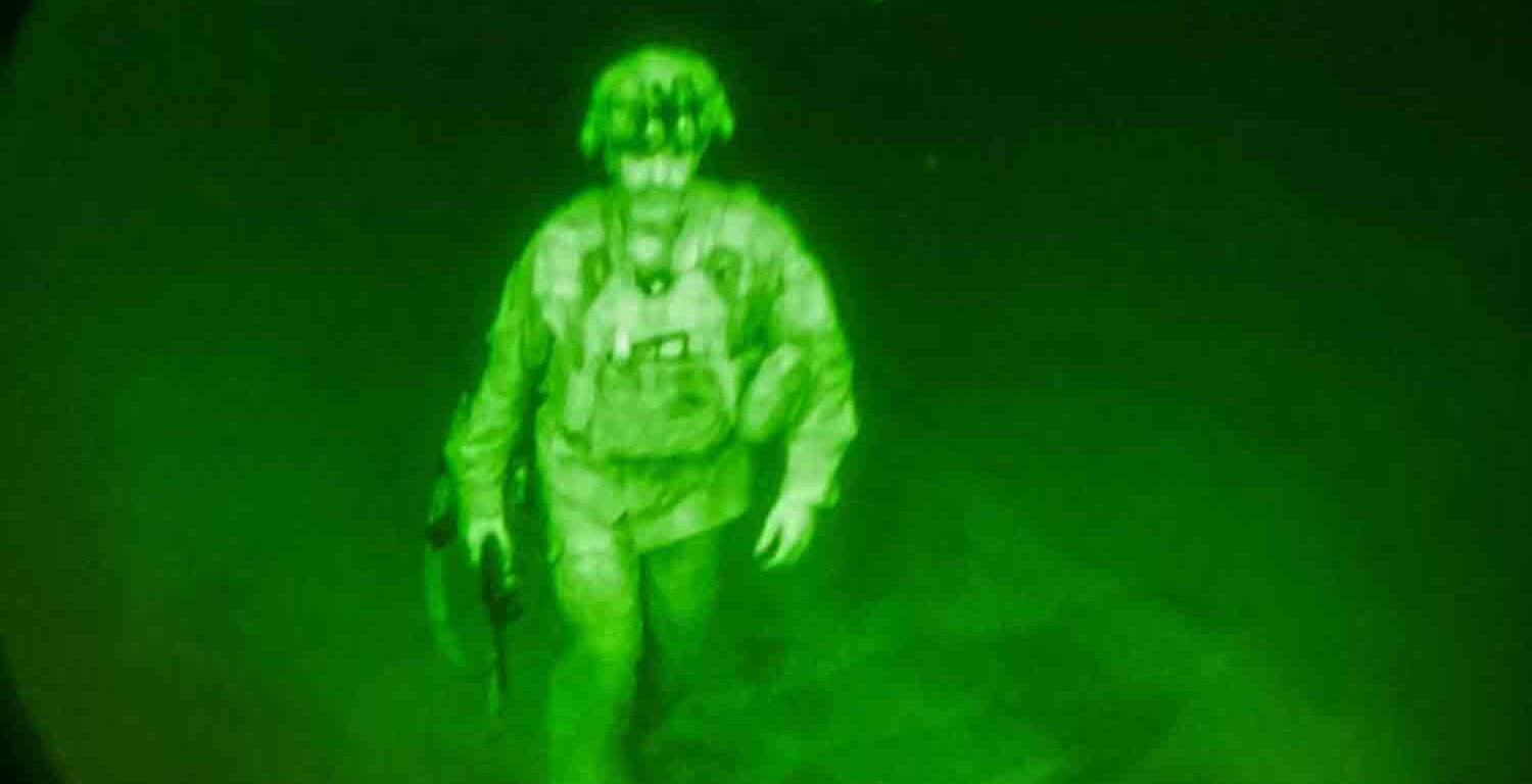 U.S. Army Major General Chris Donahue, commander of the 82nd Airborne Division, steps on board a C-17 transport plane as the last U.S. service member to leave Hamid Karzai International Airport in Kabul, Afghanistan August 30, 2021 .