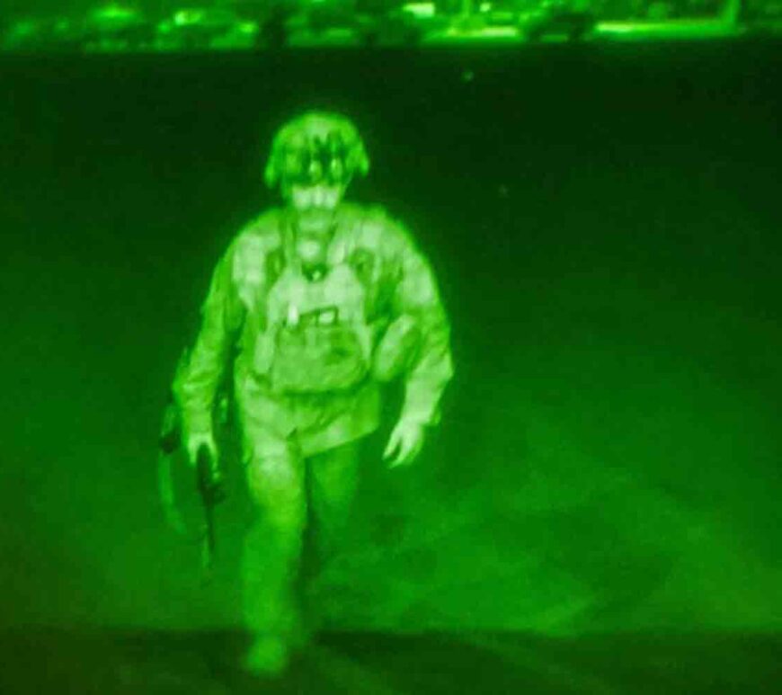 U.S. Army Major General Chris Donahue, commander of the 82nd Airborne Division, steps on board a C-17 transport plane as the last U.S. service member to leave Hamid Karzai International Airport in Kabul, Afghanistan August 30, 2021 .