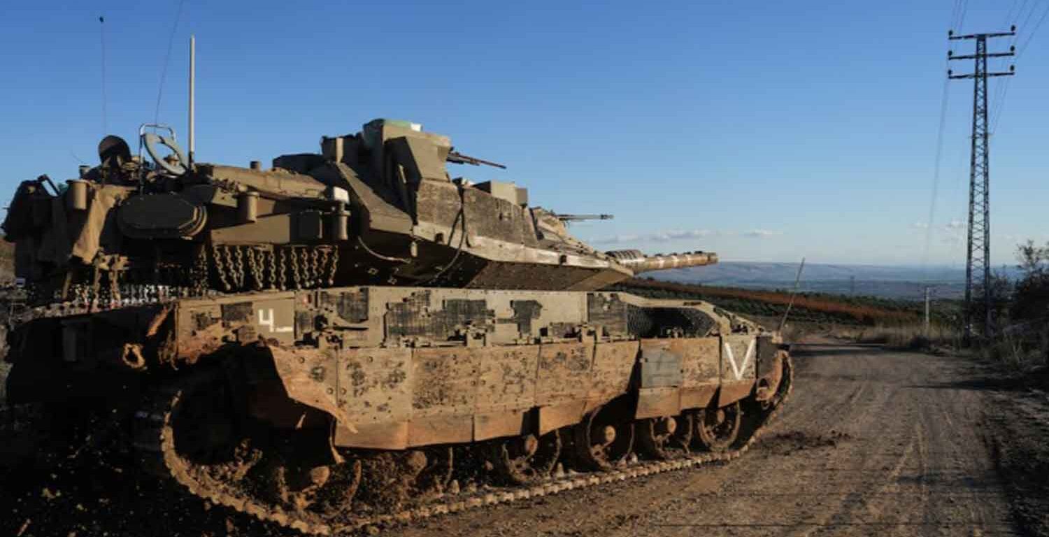 An Israeli tank maneuvers, amid cross-border hostilities between Hezbollah and Israel, by Israel's border with Lebanon in northern Israel.