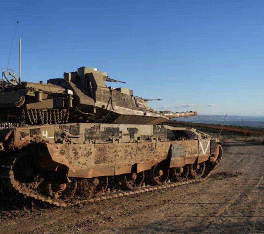 An Israeli tank maneuvers, amid cross-border hostilities between Hezbollah and Israel, by Israel's border with Lebanon in northern Israel.