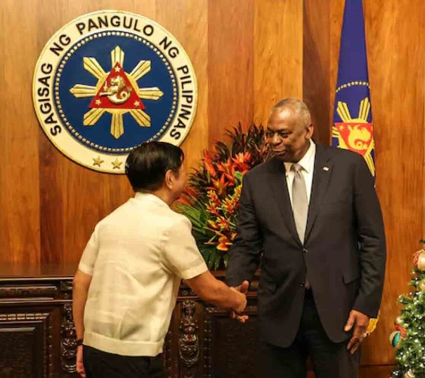 U.S. Defense Secretary Lloyd Austin shakes hands with Philippine President Ferdinand Marcos Jr during a courtesy call at the Malacanang Palace in Manila, Philippines.