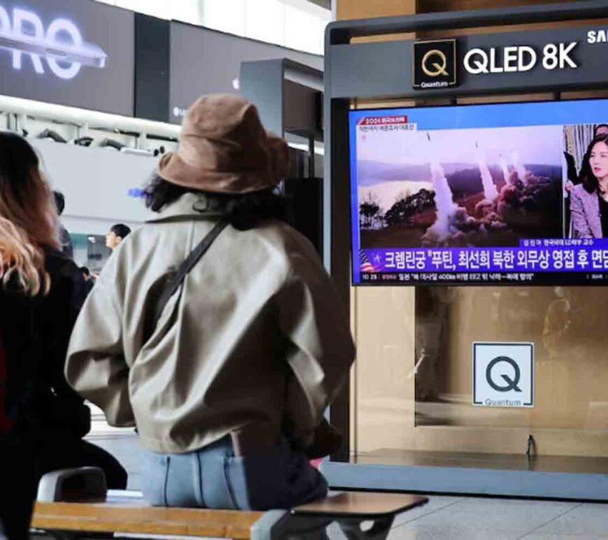 People watch a TV broadcasting a news report on North Korea firing missiles that flew 400 km after lifting off at around 7:30 a.m. from Sariwon, just south of the capital Pyongyang, at a railway station in Seoul, South Korea, November 5, 2024.