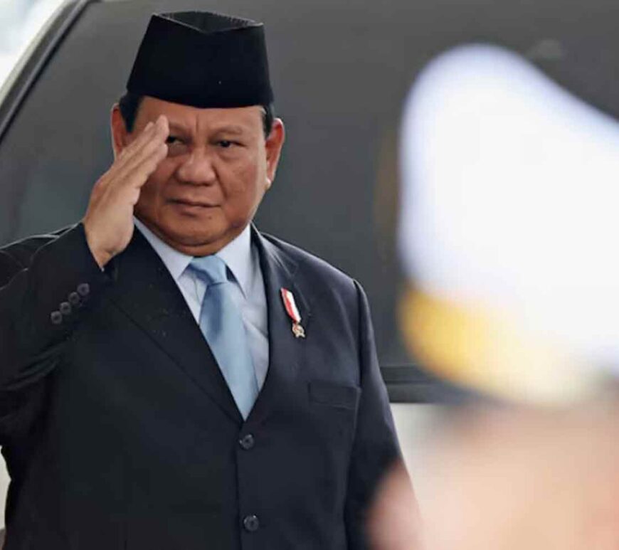 Indonesian President Prabowo Subianto gestures as he attends the annual State of the Nation Address at the parliament building