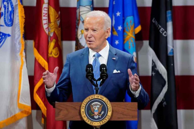 U.S. President Joe Biden speaks during a dinner with U.S. service members and their families ahead of Thanksgiving at U.S. Coast Guard Sector New York on Staten Island, New York, U.S.