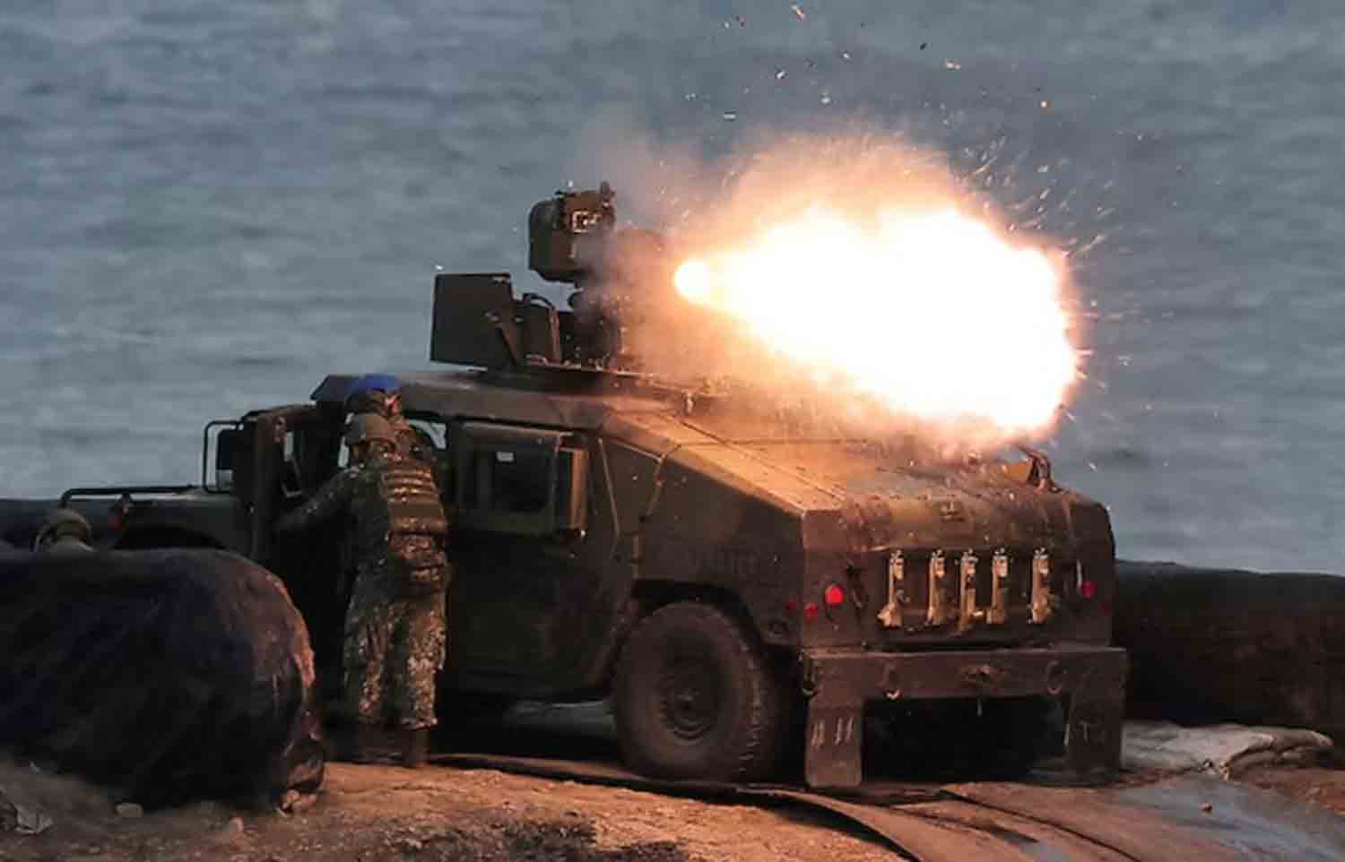 Taiwanese-Army A U.S.-made TOW-2A wire-guided anti-tank missile launched by Taiwanese soldiers from a M1167 TOW carrier vehicle at the Fangshan training grounds in Pingtung, Taiwan.