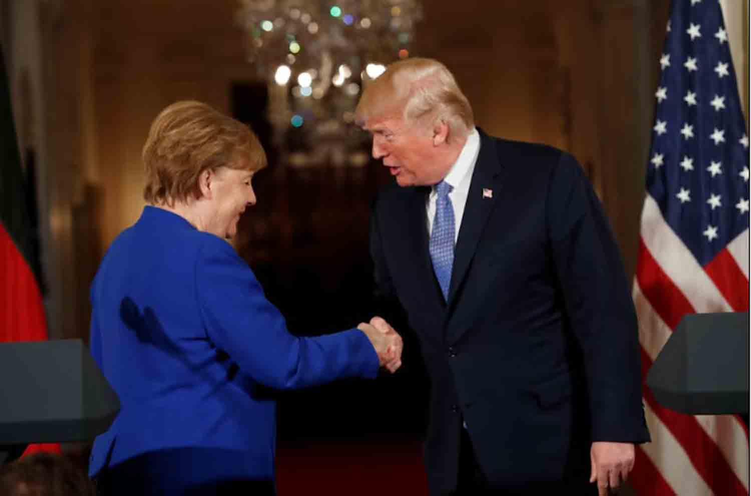 Trump-greets-Angela-Merkel U.S. President Donald Trump greets Germany's Chancellor Angela Merkel after a joint news conference in the East Room of the White House in Washington, U.S., April 27, 2018.