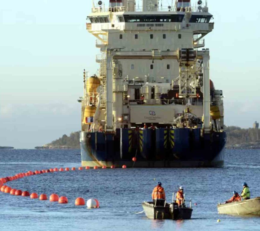 The C-Lion1 submarine telecommunications cable is being laid to the bottom of the Baltic Sea by cable ship Ile de Brehat on the shore of Helsinki, Finland.