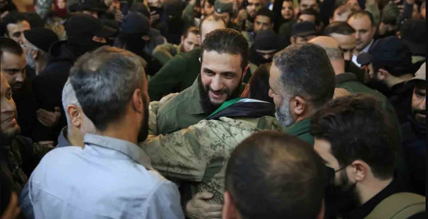 People welcome the leader of Syria's Islamist Hayat Tahrir al-Sham (HTS) group, Abu Mohammed al-Jolani, before his speech at the Umayyad Mosque on December 8, 2024.