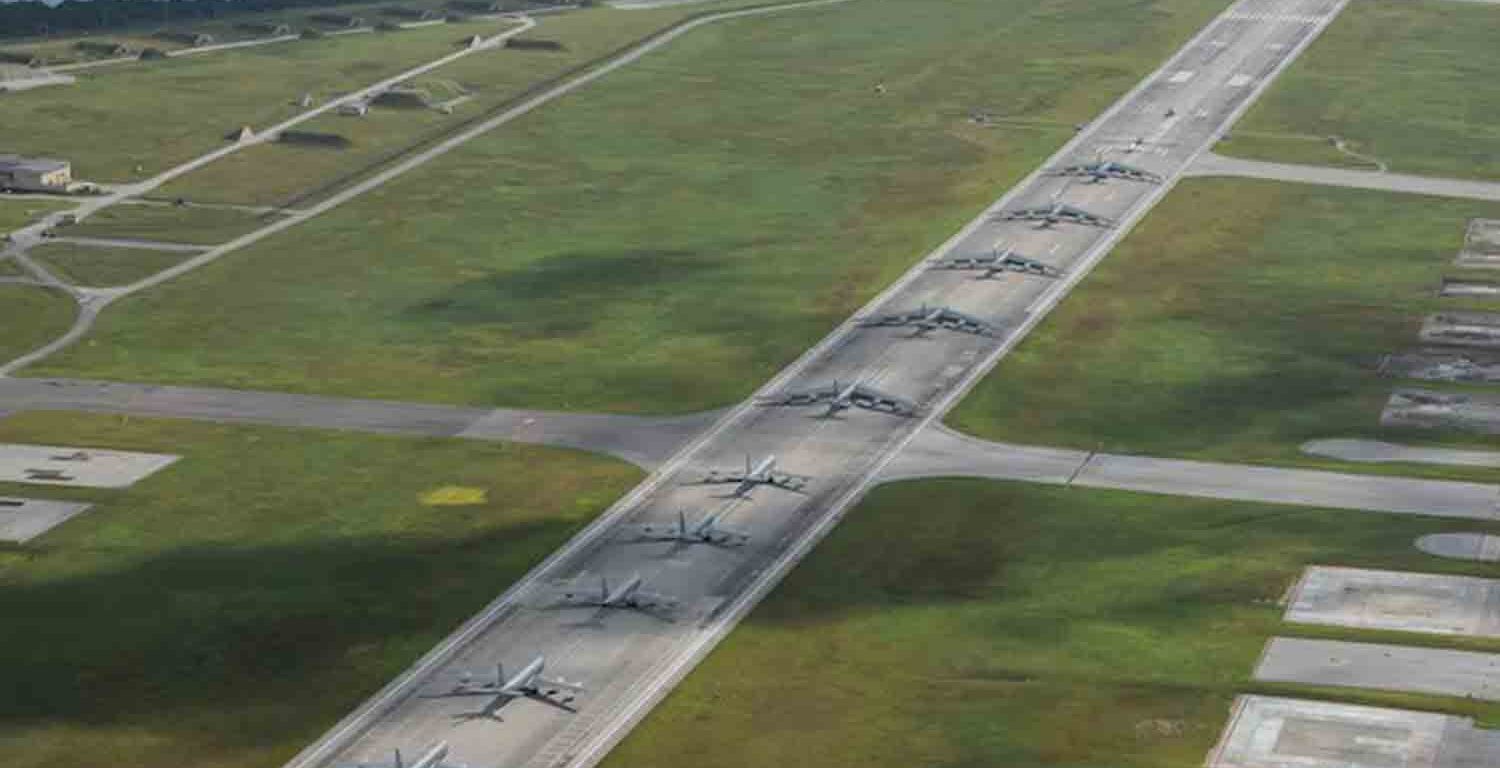 A U.S. Navy MH-60S Knighthawk, U.S. Air Force RQ-4 Global Hawk, Navy MQ-4C Triton, Air Force B-52 Stratofortresses, and KC-135 Stratotankers perform an "Elephant Walk" at Andersen Air Force Base, Guam.