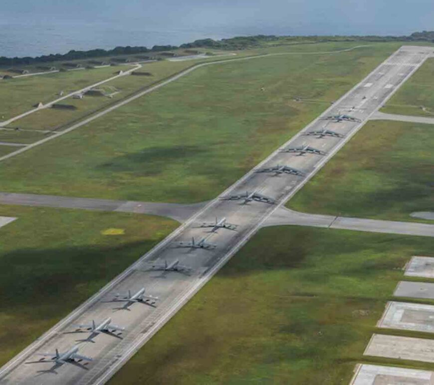 A U.S. Navy MH-60S Knighthawk, U.S. Air Force RQ-4 Global Hawk, Navy MQ-4C Triton, Air Force B-52 Stratofortresses, and KC-135 Stratotankers perform an "Elephant Walk" at Andersen Air Force Base, Guam.