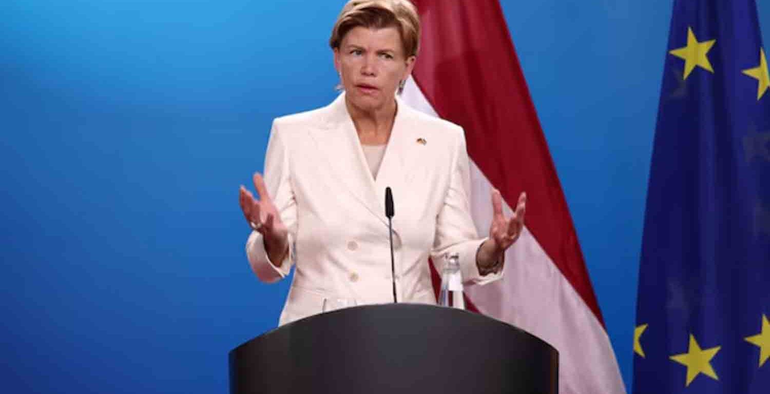 Latvian Foreign Minister Baiba Braze speaks to reporters.