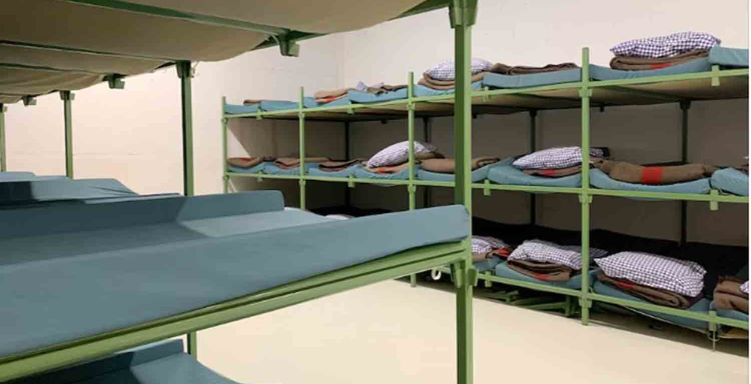 Bunk beds are seen in the atomic shelter underneath the civil protection building in Gollion, Switzerland.