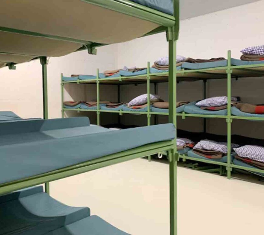 Bunk beds are seen in the atomic shelter underneath the civil protection building in Gollion, Switzerland.