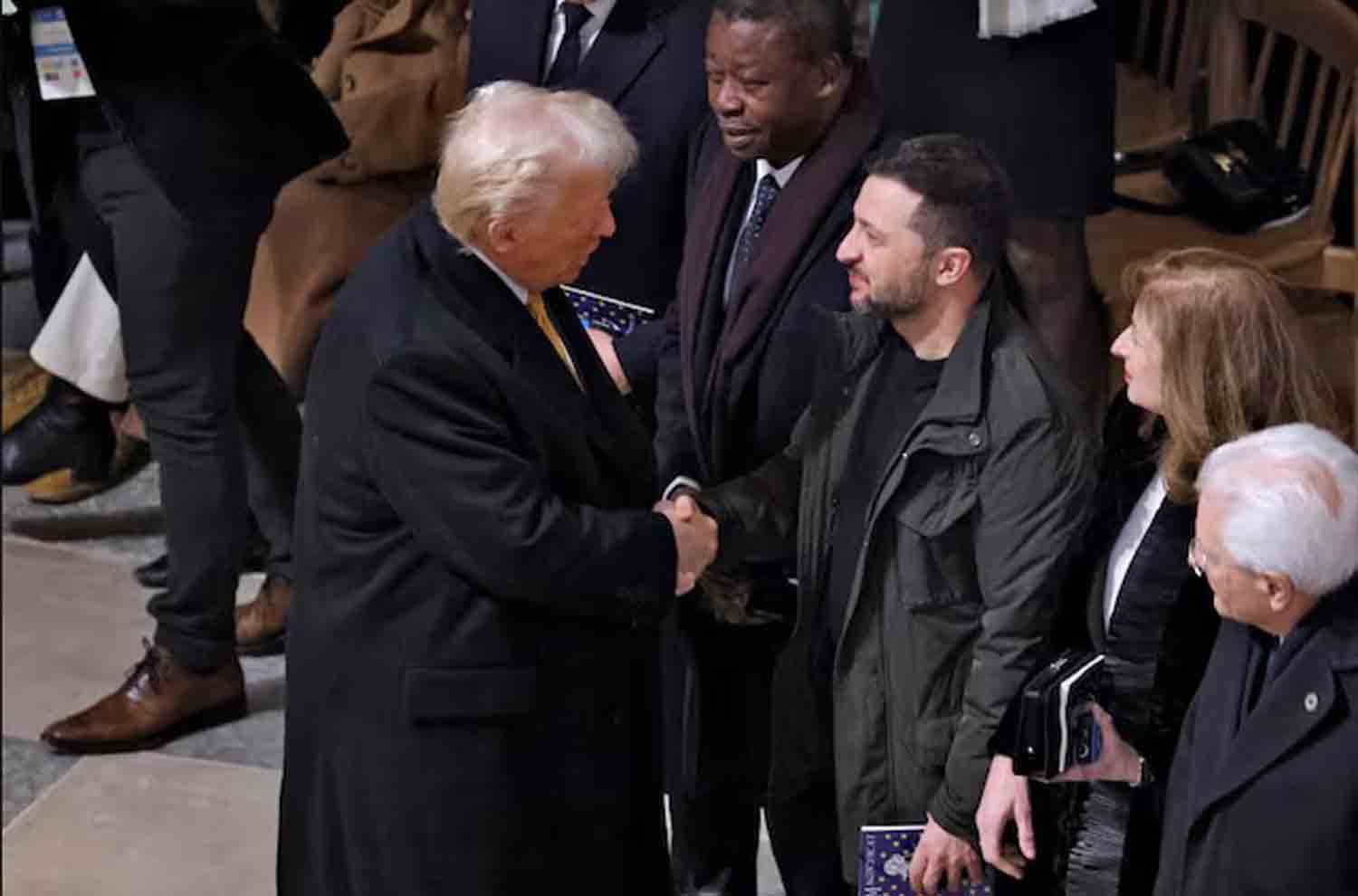 President-elect Donald Trump and Ukrainian President Volodymyr Zelenskiy shake hands inside the Notre-Dame de Paris Cathedral ahead of a ceremony to mark its re-opening following the 2019 fire, in Paris, France.