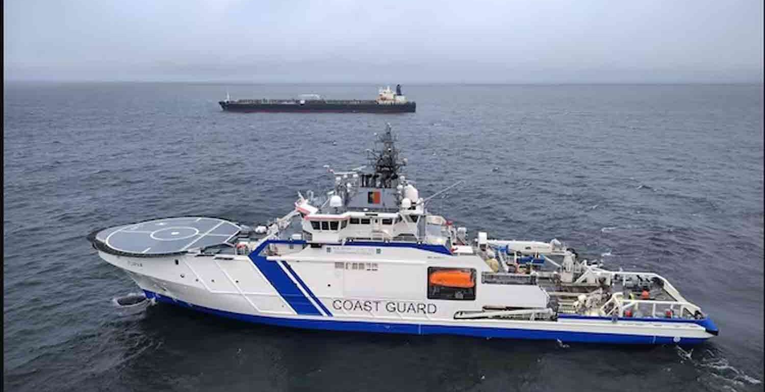 Finnish Border Guard's ship Turva and oil tanker Eagle S sail on the sea outside the Porkkalanniemi, Finland.