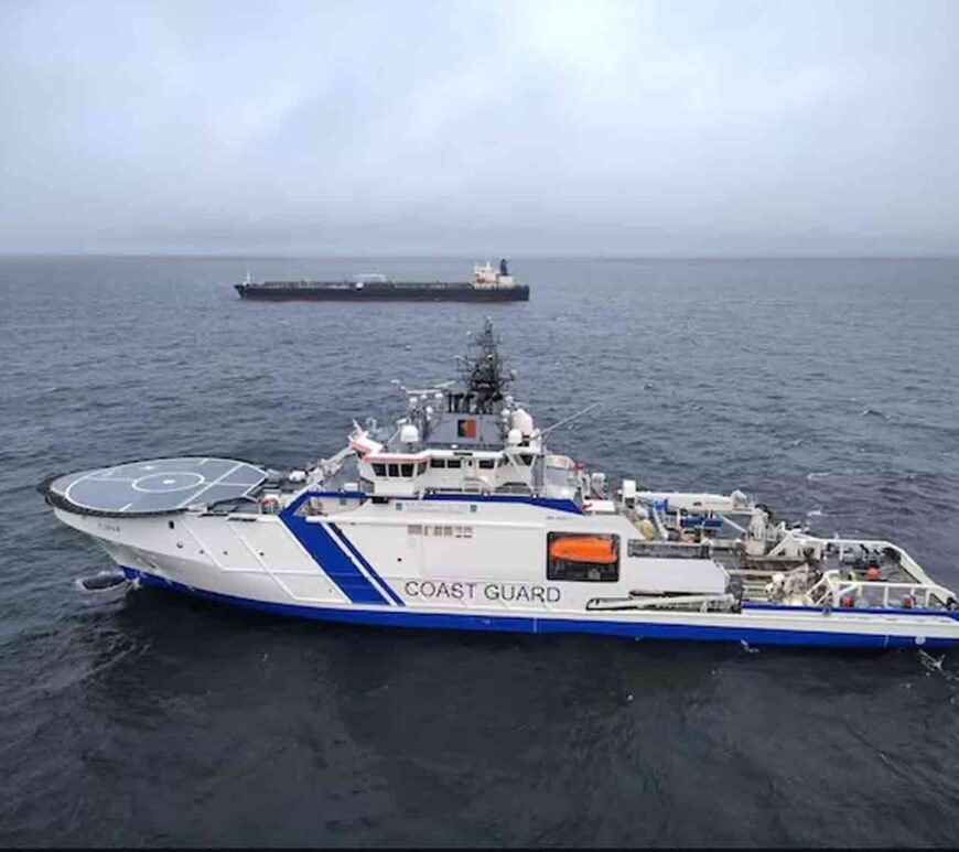 Finnish Border Guard's ship Turva and oil tanker Eagle S sail on the sea outside the Porkkalanniemi, Finland.