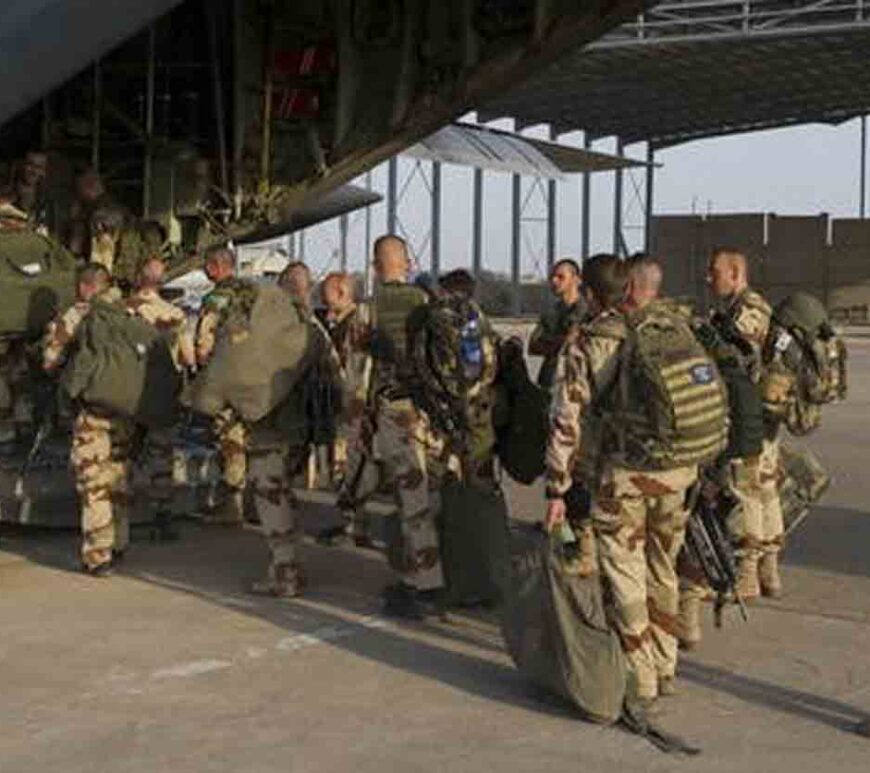 French soldiers prepare to board on a fighter plane at Kossei camp at the French military base of N'Djamena in Chad.