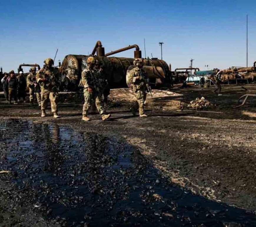 US soldiers inspect the site of reported Turkish shelling days earlier on an oil extraction facility on the outskirts of Rumaylan, in Syria's Kurdish-controlled northeastern Hasakeh province.