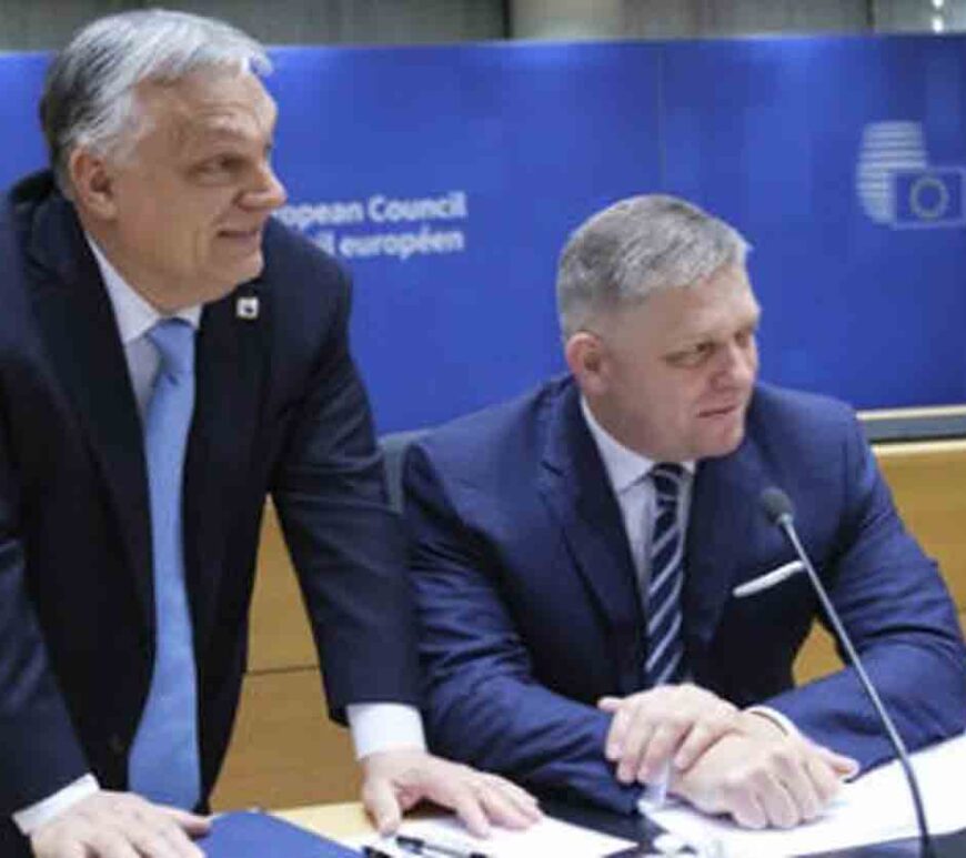 Hungarian Prime Minister Viktor Orban (L) and Slovak Prime Minister Robert Fico (R) at the EU Council headquarters, Brussels, Belgium.