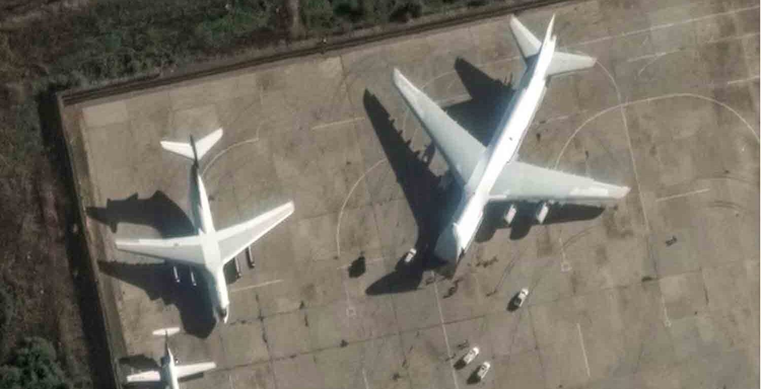 satellite image shows An-124 heavy transport aircraft with its nose cone lifted, at Russian Khmeimim airbase, near Latakia, Syria, December 13, 2024.