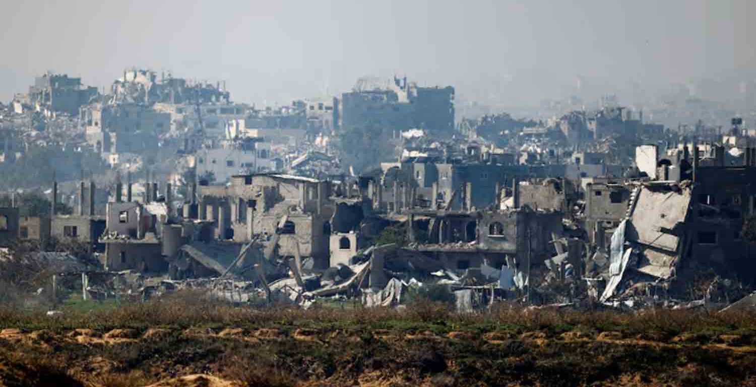 Buildings lie in ruin in North Gaza, amid the ongoing conflict between Israel and Hamas, as seen from Israel.