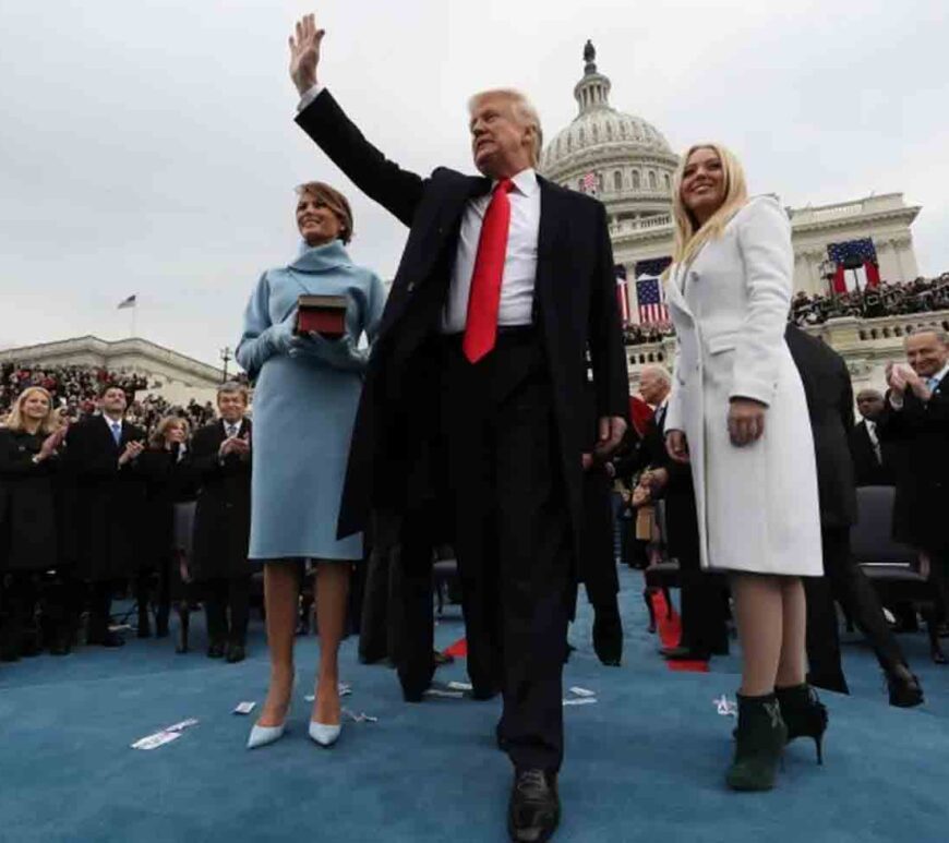 President Donald Trump waves after taking the oath of office for his first term on January 27, 2017.