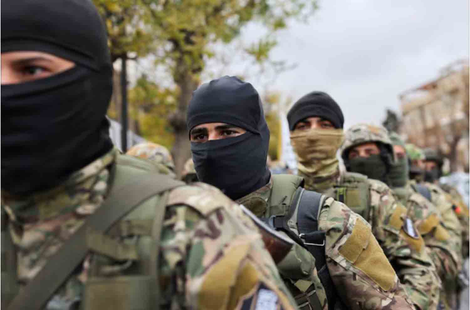 Khaled Brigade, a part of Hay'at Tahrir al-Sham (HTS), hold a military parade, after Syria's Bashar al-Assad was ousted, in Damascus, Syria.