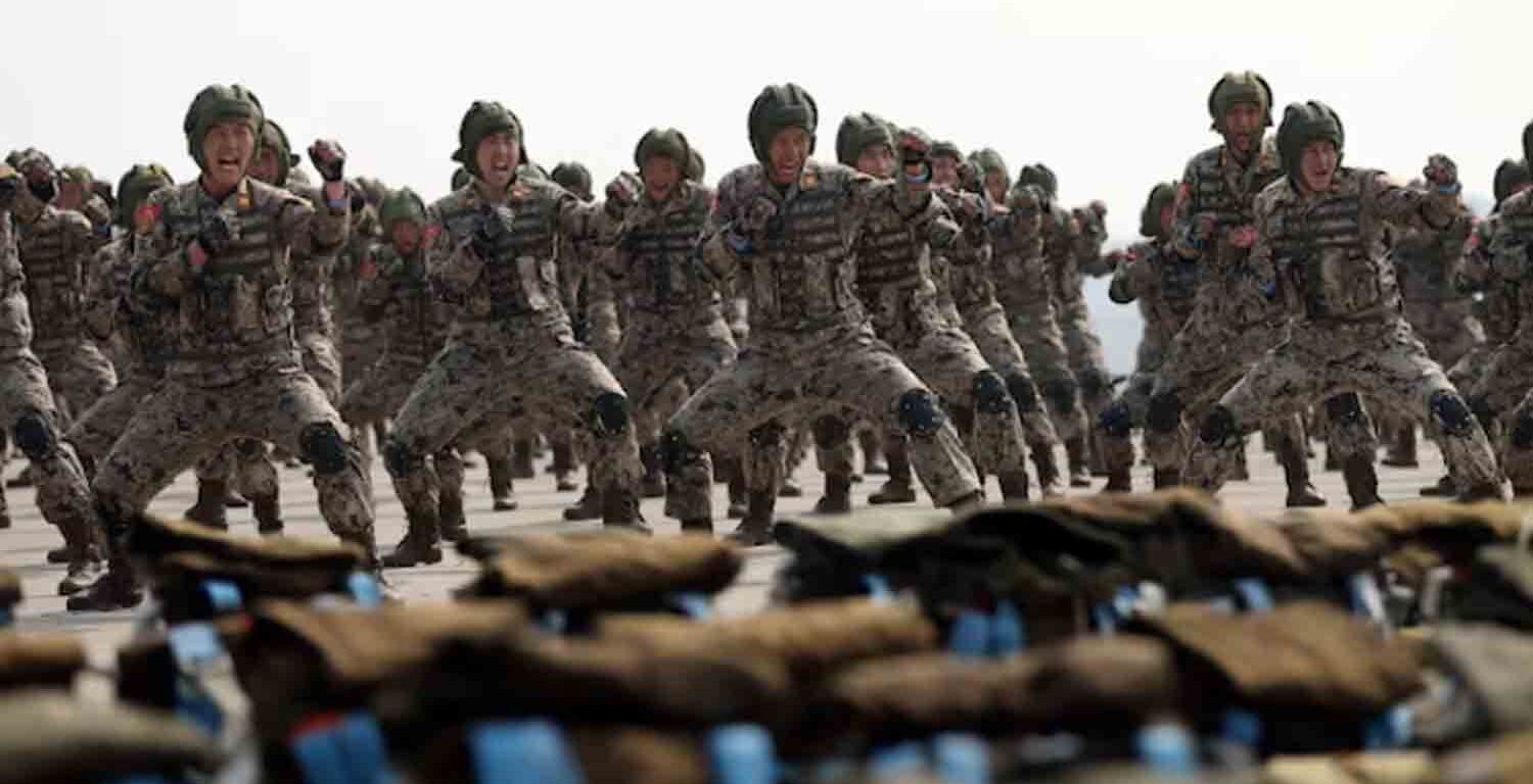 Soldiers participate in a demonstration during the training of the Korean People's Army's air and amphibious combat units, in this picture.