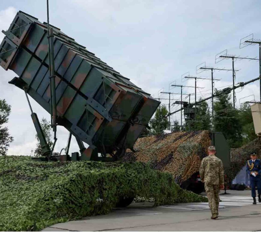 Ukrainian service members walk next to a launcher of a Patriot air defence system, amid Russia's attack on Ukraine, in an undisclosed location, Ukraine.