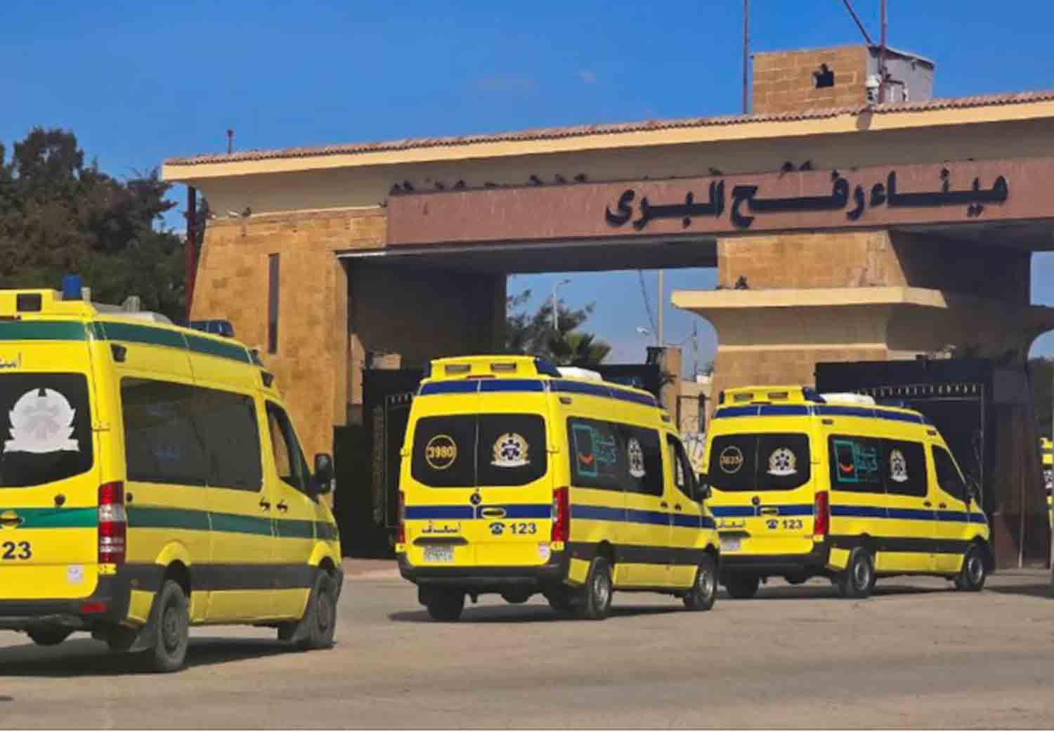 Egyptian ambulances transport to the Gaza Strip through the Rafah border from Egypt side, following a ceasefire between Israel and Hamas, in Rafah, Egypt.
