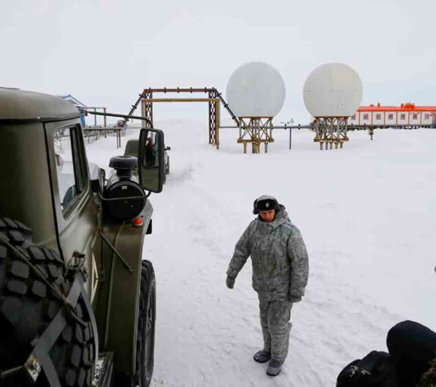 Russian soldiers stand at a radar facility on the Alexandra Land island near Nagurskoye, Russia.