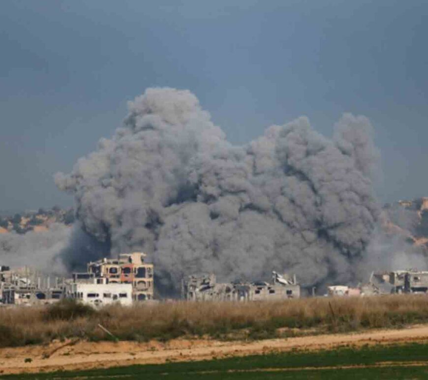 Smoke rises after an explosion in northern Gaza, before a ceasefire deal between Israel and Hamas goes into effect, as seen from Israel.