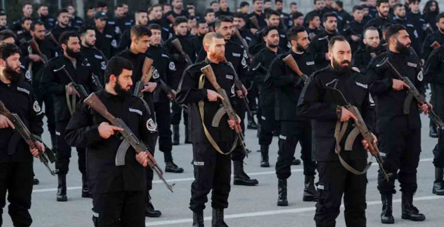 Syrian police members attend their graduation ceremony, after the ouster of Syria's Bashar al-Assad, at the Police Academy under the Syrian Salvation Government, in Damascus, Syria.